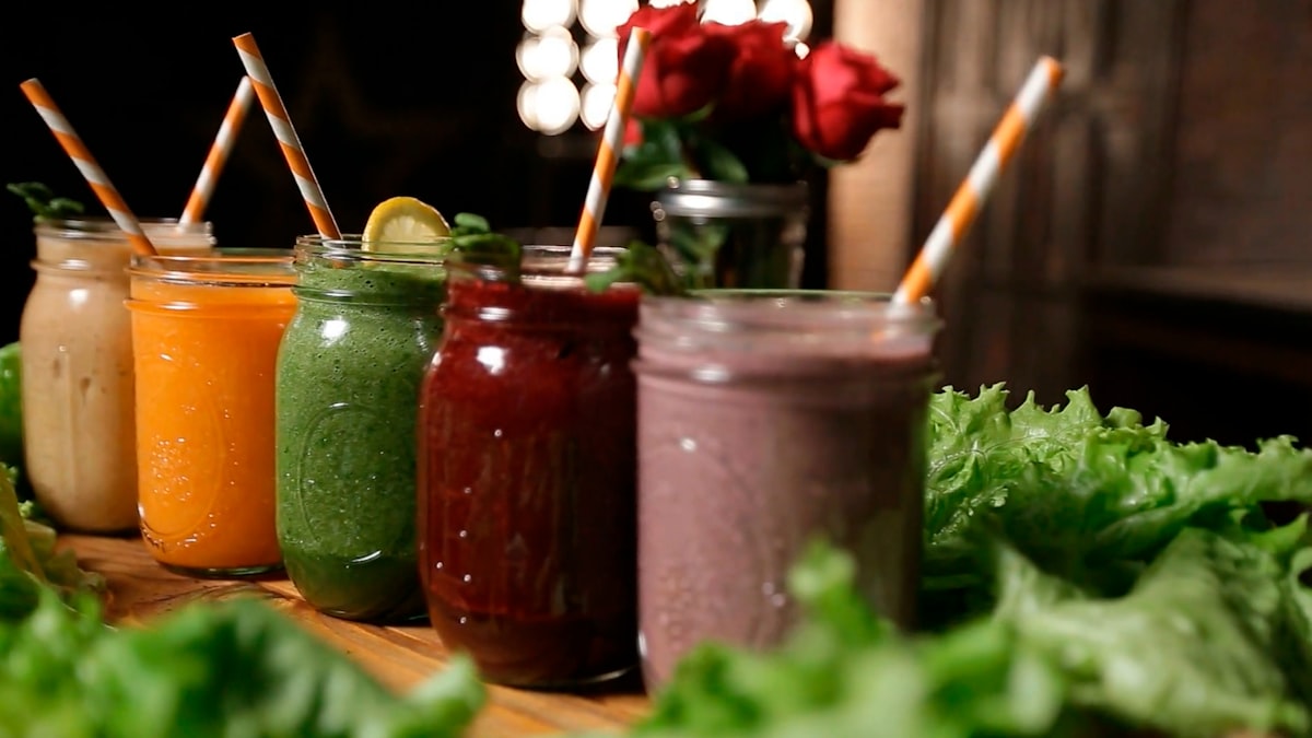Fresh colorful juices and smoothies with fruits and vegetables